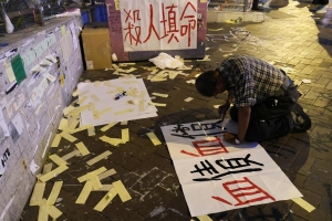 Amid gleaming skyscrapers, Hong Kong’s poor set aside hardships and join protests