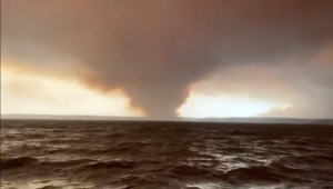 Australian bushfires claim third victim as more than 100 blazes burn