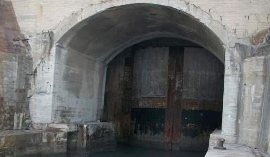 Recent Chinese military enthusiast websites have posted photographs of suspected Chinese submarine tunnels. In May, photos posted online showed the opening of a nuclear missile submarine cave at an undisclosed location.