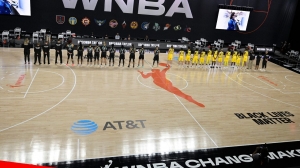 WNBA players walk off court during national anthem ahead of season opener