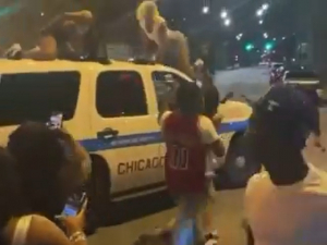 Chicago Police Investigating Girls Twerking on Cop Car as 55 Shot Last Weekend