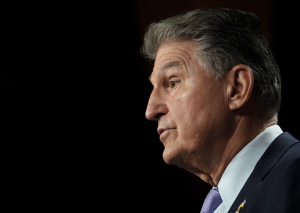 Senate moves forward to fund government despite snags over Manchin’s energy plan