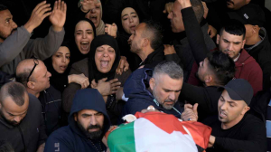 Israeli troops fatally shoot Palestinian teacher, militant during raid in occupied West Bank