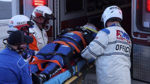 NASCAR Truck Series driver Dean Thompson involved in serious wreck, put on stretcher into ambulance