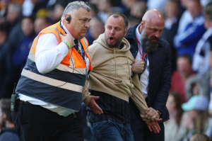 Leeds fan arrested, slapped with lifetime ban for confronting Newcastle manager mid-game