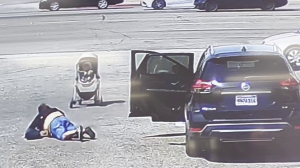 Video shows moment baby in stroller rolling toward traffic is saved by good Samaritan