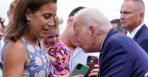 Watch: Joe Biden Nibbles Toddler’s Shoulder on Final Day of European Trip